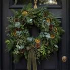     Bespoke handcrafted Christmas door wreath by Bloomin’ Chic Florist Oxford