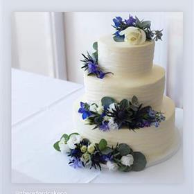 fwthumbReception-cake-flowers-blue-oxford-wedding.jpg