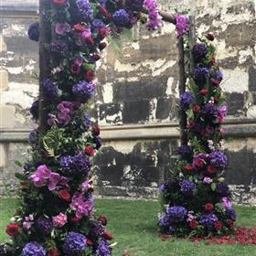 fwthumbceremony-archway-red-pink-purple-wadham-garden-oxford-wedding.jpg