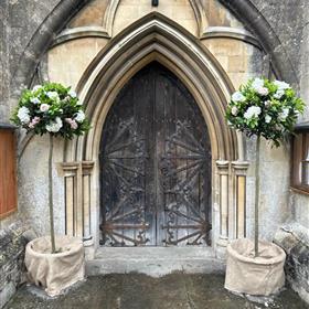 fwthumbceremony-entrance-decorated-trees-oxfordshire-wedding.jpg